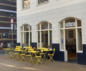 bright yellow terrace at Revista Coffee in Groningen