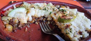 The inside of the potato pie at Pura Vida in El Calafate