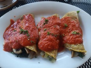 Enchiladas with Spinach, Mushroom and Onion at Sugar & Spice in Boquete