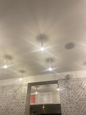 Menú indicating 100% Churros (small print-excuse me)  at Churrería El Moro - Roma in Mexico City