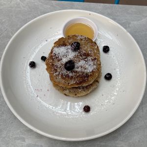 Coconut pancakes with berries  at Planta in Phnom Penh