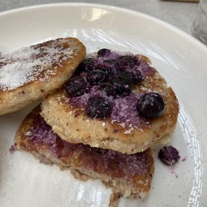 Coconut pancakes with berries  at Planta in Phnom Penh