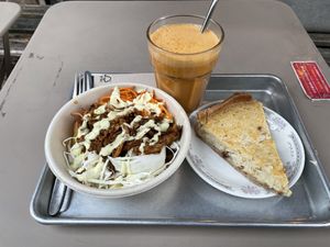 Carrot, apple and ginger juice, pulled “pork” salad and traditional alsacien quiche  at Origin - Coffee Shop Végétal in Strasbourg