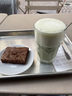 Peanut brownie and oat milk matcha latte  at Origin - Coffee Shop Végétal in Strasbourg