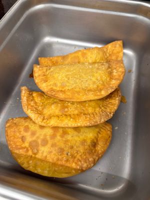 Puerto rican style empanadas- fillings include- pizza, guava and cheese, karneigh( picadillo style vegan ground) at RiCoQui Plant-Based Street Food in Charlotte