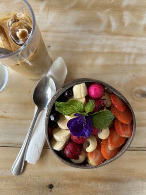 Dragon fruit smoothie bowl & iced latte (decoff)   at Good Stuff Cafe & Eco Store in Amed