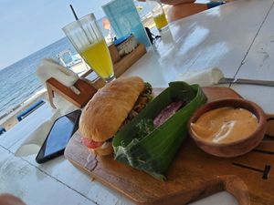 Pulled bbq jackfruit burger with sweet potato fries and vegan mayo. at SALT in Amed