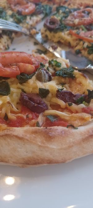 Delicious vegan pizza here this evening. at Dolphin Pizzas in Symi