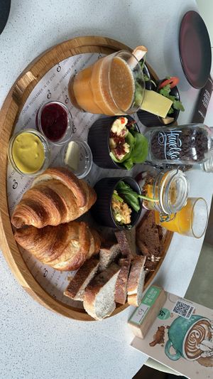 The black bowl directly behind the mango drink and the black bowl to the right of the mango drink with egg in it are NOT vegan. Everything else is vegan:)   at Anne&Max in Delft