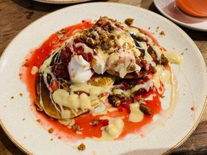 Vegan Raspberry white chocolate pancakes   at Second Home Studio + Cafe in Aberdeen