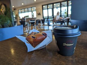 Vegan blueberry muffin and oat milk flat white at Elizabeth Town Bakery Cafe in Elizabeth Town