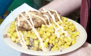 Bowl with beans & quinoa, corn, fried chicken, cheesy sauce, at Oakland VegFest 2016 at Southern Fried Vegan BBQ in Los Angeles