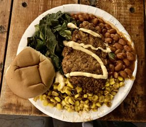 Fried chick’n, beans, collard greens, corn, roll  at Southern Fried Vegan BBQ in Los Angeles
