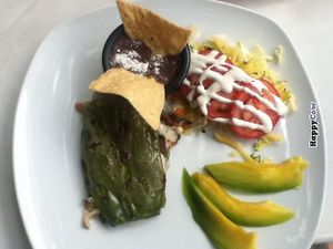 Photograph of my Nopales Rellenos meal - small bowl of refried beans, salad, and some cut avocado (not in the photograph are a bowl of warm corn tortillas. at 2012 Espacios Mayas y Algo Mas in Merida