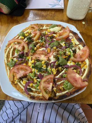Vegarden Pizza with vegan cheese    at Vegarden in Medellin