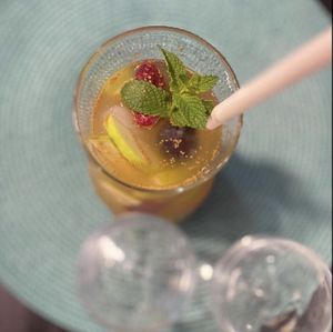 Sangria white 1L for 8€ with fruit and mint from own farm, cinemon stick and spark of Mouscatel de Setúbal + ice  at Veganicelos in Setubal