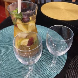 Sangria white 1L for 8€ with fruit and mint from own farm, cinemon stick and spark of Mouscatel de Setúbal + ice  at Veganicelos in Setubal