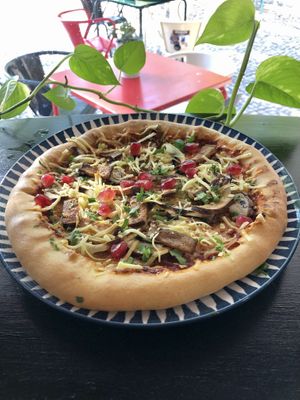 Pizza 8€ / pizza on photo is with cheese baked in crust for 10€  at Veganicelos in Setubal