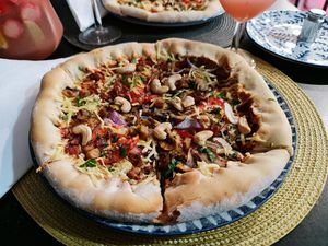 Pizza with cheese crust 10€  at Veganicelos in Setubal