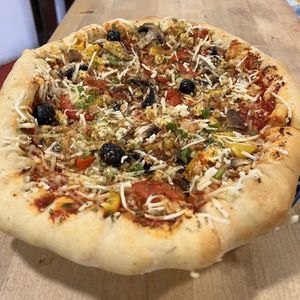 Pizza with cheese in crust 11€   at Veganicelos in Setubal