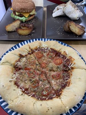 Cheese burger 9€, wrap 6€’ pizza 11€  at Veganicelos in Setubal