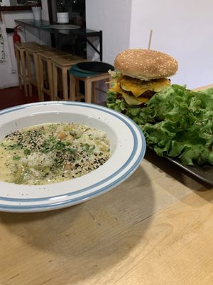 Risotto (8€) is gluten free with mushrooms, bellpepper and caju nuts / Double Smash Facon Beyond meat burger 16€  at Veganicelos in Setubal