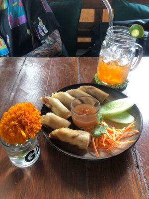 Paw pia rolls and lemongrass ice tea at Natnat Thai Comfort Food in Amed