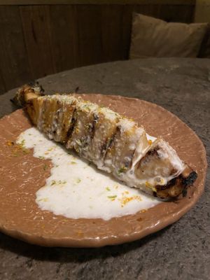 Piña Asada with coconut cream- on the dessert menu   at Honest Greens - Gran Via in Madrid