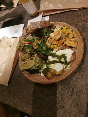 Herb tofu with smashed potatoes, quacamole and sweet corn at Honest Greens - Gran Via in Madrid