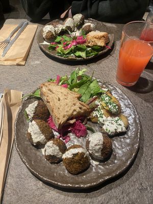 Falafel salad plate with smashed potatoes   at Honest Greens - Gran Via in Madrid