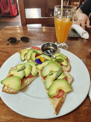 Toast with avocado, tomatos, basil and vinegar. Ask to be made without butter. at JC's Cafe in Cusco