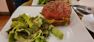 Vegan burger with salad at l'Autre Rive in Berrien