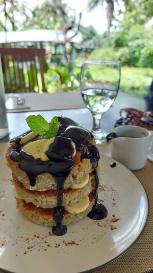 Vegan Oat pancakes with extra banana and chocolate sauce at Lockdown Kitchen in 