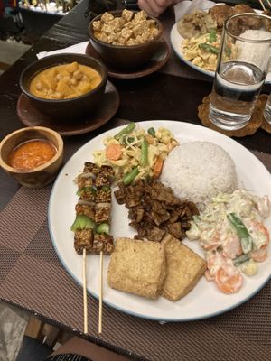 Nasi campur which you can DIY yourself. I chose sweet tempeh, sate tempeh, tofu, veg rendang, chickpea and pumpkin curry, and coconut veg.   at Lockdown Kitchen in 