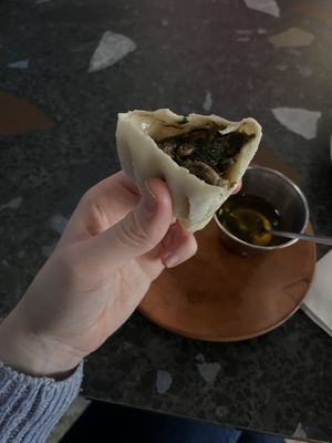 Mushroom khinkali (has cilantro)  at Cafe Daphna in Tbilisi