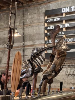 Check out these tap handles!  at Seward Brewing Company in Seward