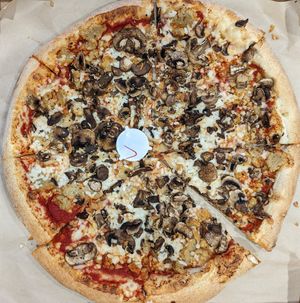 vegan cheese, mushrooms, and shredded seitan chicken at The Pie Delivery in Salt Lake City