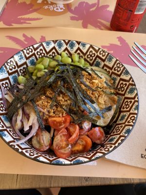 black rice, fried tofu, edamame, nori, cherry tomatoes, onions, fried onions and olive oil/sesame sauce dressing   at Poke Formentera in Formentera