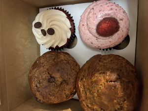 Two vegan banana, chocolate chip muffins, and two vegan cupcakes, one red velvet, and one blush, a.k.a. raspberry.  at Sunflour Baking Company: Ballantyne Bakery in Charlotte