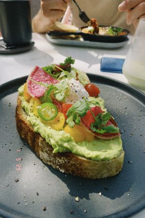 Super tasty avocado 🥑 toast, with self baked bread.   at Tinoc Café in Merida