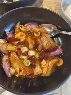 Kong Bao eggplant in a sweet and sour spicy sauce with cashew nuts and spring onions  at Le Nove Scodelle in Milan