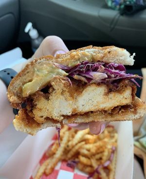 Hot chicken sandwich with peach and pine pop up  at Hot Chicken Mama in Blue Point