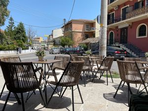places to sit outside (attention: busy and noisy street)  at ΜΠΟΧΩΤΗΣ ΑΘΑΝΑΣΙΟΣ & ΣΙΑ Ο.Ε. in Corfu