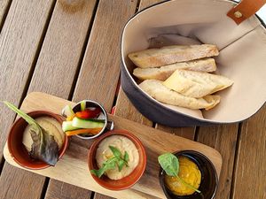 Two hummuses, one lentil spread, baguette at Malom és Kacsa in Tata