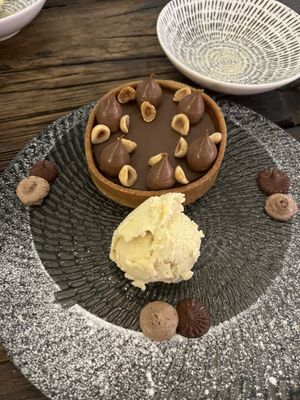 Chocolate tart with vanilla ice cream  at People of Tomorrow in New Delhi