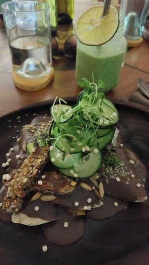 Enfrijoladas and green smoothie at Agni Vital Kitchen in Bacalar