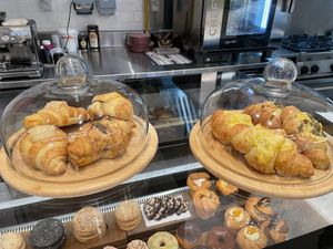 Vegan cheese and Zatar’s croissant and almond croissant   at Flour Girl Bakeries - Delivery in Dubai