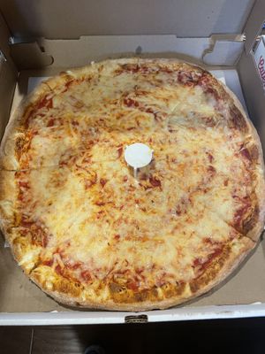 Plain cheese pizza. Good but could be cooked longer  at Luigi's Pizzeria in East Setauket