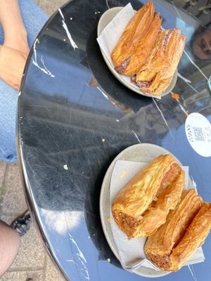 Sausage rolls, cinnamon roll and pain au chocolate   at WAY Plant Based Bake House in Ghent