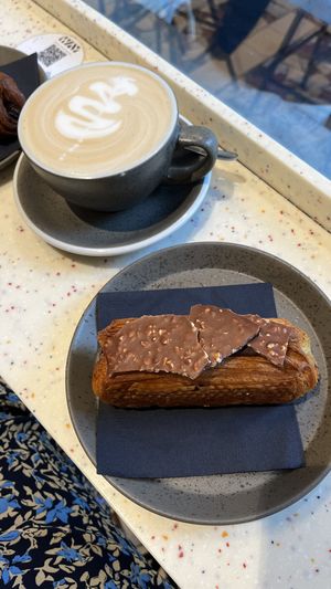 Latte machiatto with hazelnutcream pastry  at WAY Plant Based Bake House in Ghent